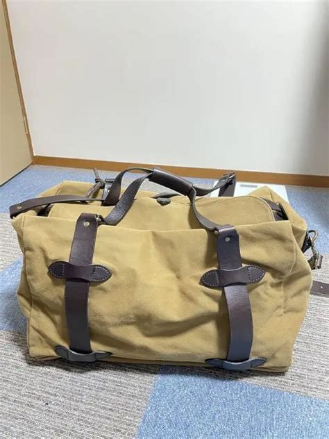 how to identify fake filson bag|14 Ways To: Spot FAKE Designer Bags (With Pictures).